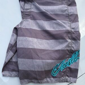 😎vintage O’Neil Board shorts Size 38 Gray Striped Shorts with Teal Logo